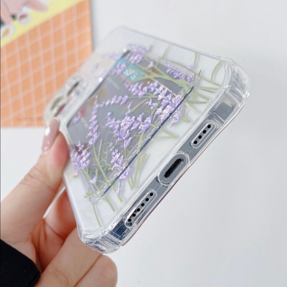 NWT Beautiful IPhone 12 phone case with molded lens cover and card slot.